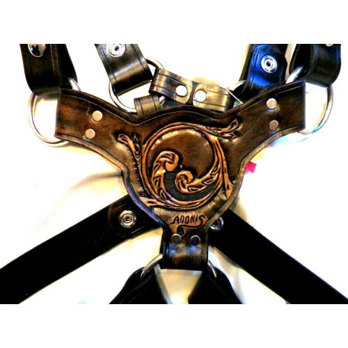 A Black Color Leather Harness With Waves Design