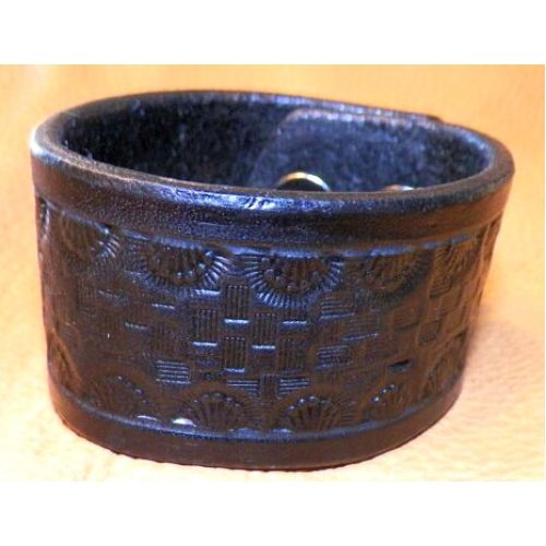 A Dark Shade Leather Band With Design and Knobs