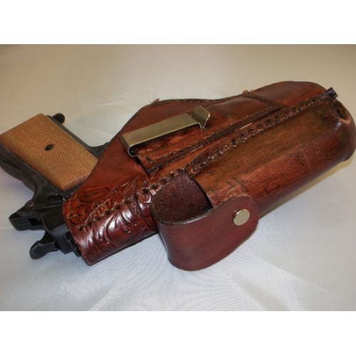 A Gun Inside a Brown Color Leather Pouch