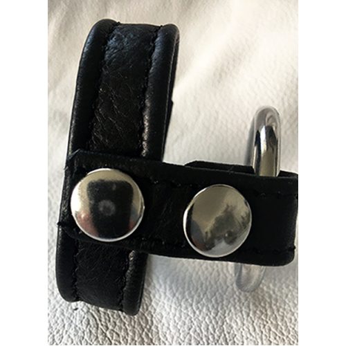 A Black Color Leather Strap With Metal Knobs
