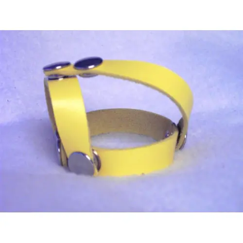 A Yellow Color Leather Band With Button Setting