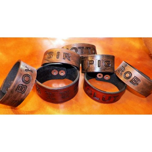 A Bunch of Leather Band With Wordings on Top